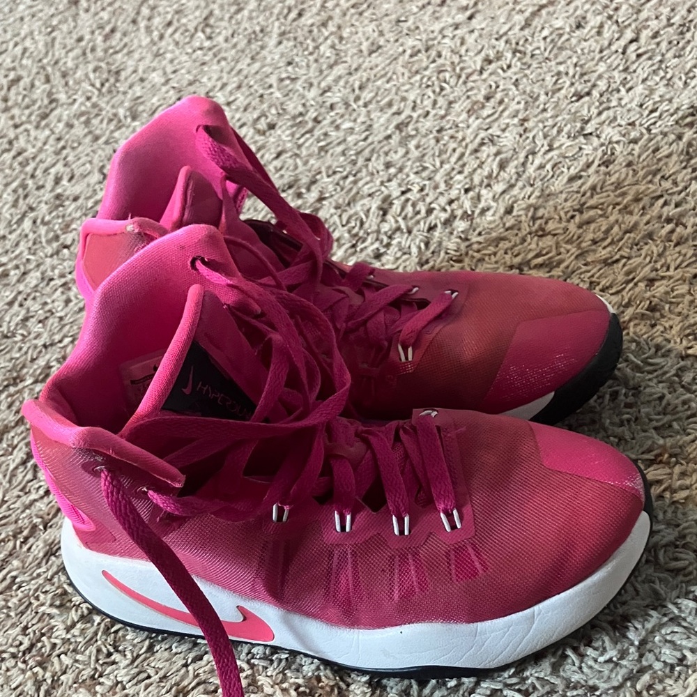 Nike Kids Shoes in Pink and White basketball shoes. Good traction, ankle support